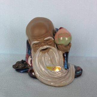 Old Man with Peach
